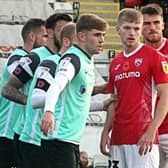 Liam Shaw (right) and Kieran Phillips (third right) impressed while on loan with Morecambe last season Picture: Michael Williamson