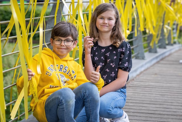 Claire and Rhys Guthrie at the Yellow Ribbon Day. Ribbons will remain on display throughout June and July.