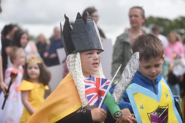 The event was the first of its kind in more than two years, as the outbreak of Covid-19 in early 2020 meant the parade and funfair could not go ahead.