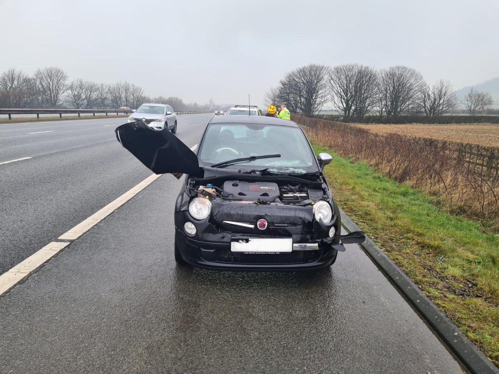 &#8216;Drunk&#8217; motorist arrested after being caught driving wrecked car with bonnet hanging off on M6