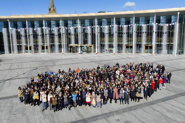 The University of Central Lancashire’s staff and students have come together to celebrate International Women’s Day, uniting for a picture on the University Square, in the ‘embrace’ pose, which is linked to this year IWD’s theme of #EmbraceEquity.