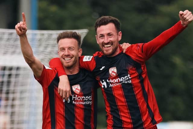 Paul Lewis (right) has scored twice this season for Morecambe
