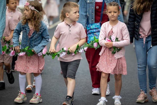 Flowers were sported by these youngsters as they took part in the Kirkham and Wesham Club Day procession