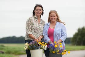 Clare Ashcroft and Alison Matthews picking flowers at their flower farm in Burscough.