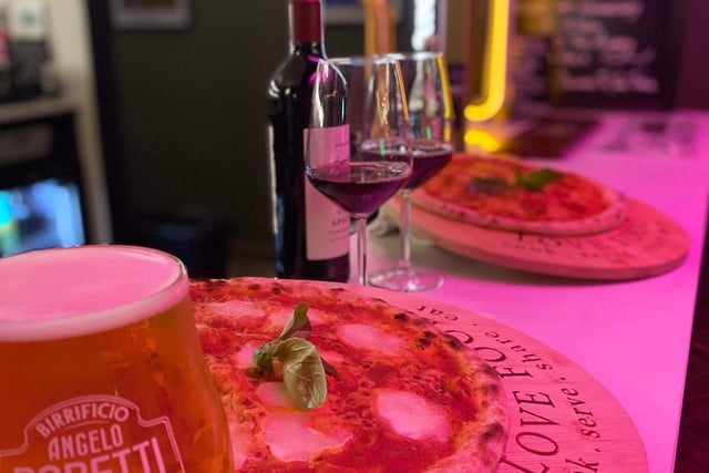 Customers can choose from a beer, a wine or a soft drink to wash their pizza down with