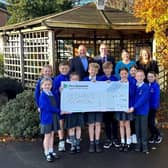 Pupils of St Chads with teachers, Councillor Alf Clempson and Persimmon Lancashire MD, Anthony Mansf
