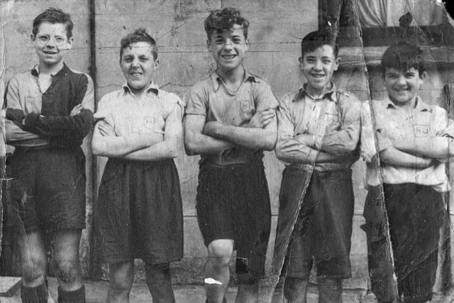 This picture was sent in by Bob Scanlan (Scanny)
Higginson St Football lads
Scene was in Higginson street,Preston in 1950 football lads.
Bob Scanlan,Jimmy Lee,Jackie Norris,Ronnie Townson,Tommy Dorbigan.