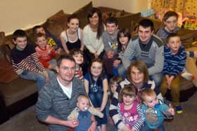 Noel and Sue Radford with 16 of their 22 children