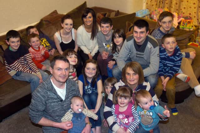 Noel and Sue Radford with 16 of their 22 children