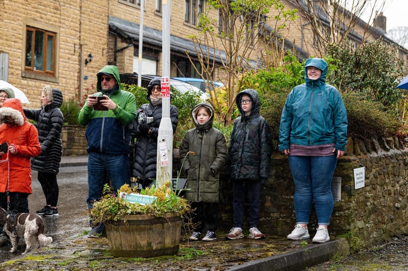 Crowds brave the rain awaiting the arrival of Princess Anne to Trawden. Photo: Kelvin Lister-Stuttard