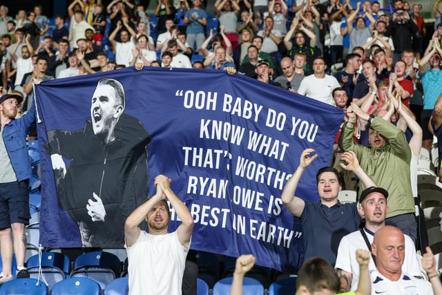 The Preston faithful display their banner for manager Ryan Lowe.
