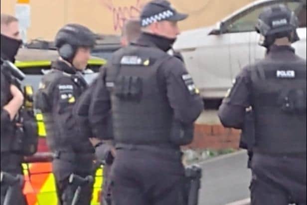 Armed officers at the scene in Corporation Street, Preston on Sunday (March 13)
