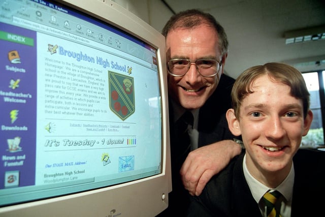 Head of design and technology Bill Eccles and year 10 pupil Darrell Marjoram, 15, from Broughton High School, near Preston, who have designed and installed an internet page for the school