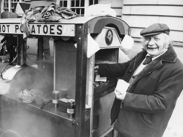 Ernie Rhodes on his hot potato stall at Preston's Flag Market in 1980