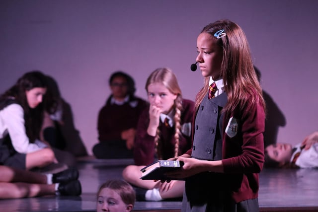 Pupils perfoming on stage