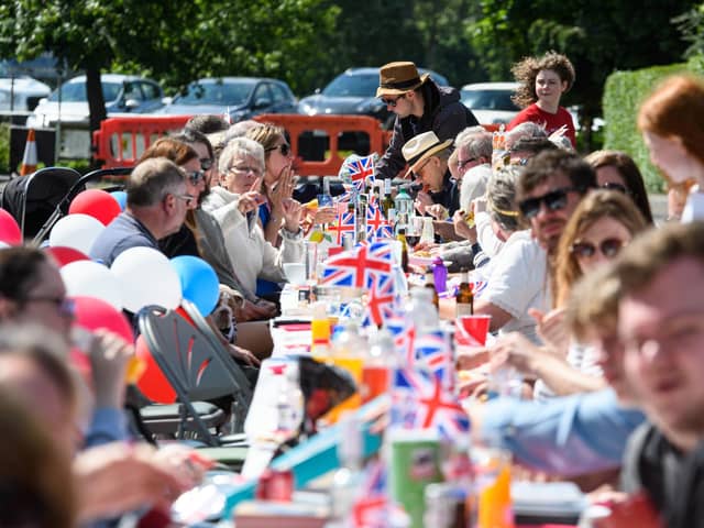 Residents enjoy the Queen's Platinum Jubilee Street party on Windsor Avenue in New Longton. Photo: Kelvin Stuttard