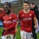 Morecambe skipper Yann Songo'o celebrates Saturday's win against Swindon Town Picture: Morecambe FC