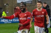 Morecambe skipper Yann Songo'o celebrates Saturday's win against Swindon Town Picture: Morecambe FC