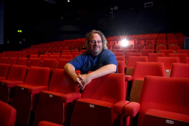 Photo Neil Cross; Ian Robinson at Chorley Theatre where they have a seat accessibility guide