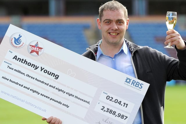 Burnley FC fan Anthony Young celebrates his £2.38 million lottery win at Turf Moor in April 2011