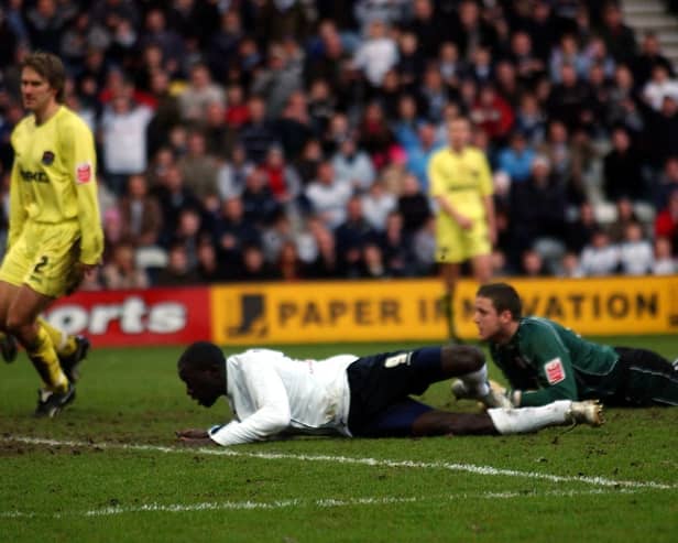 Patrick Agyemang scores Preston North End's first goal against Millwall at Deepdale in January 2006