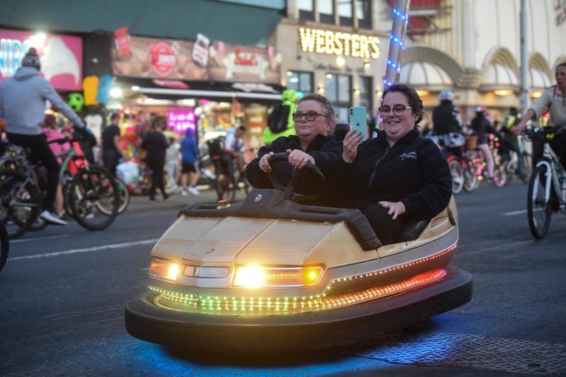 What a way to ride the lights - in a gold-coloured dodgem car!