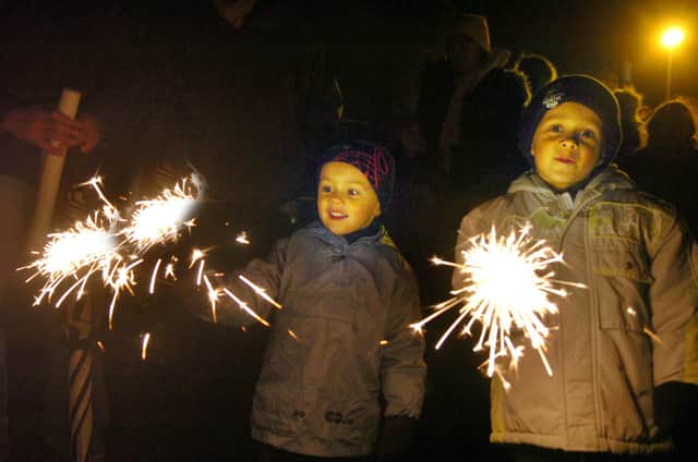 Lucas and Sam Dodd with their sparklers at the Garstang Bonfire