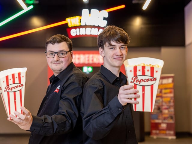 Brand new team of staff ready to serve popcorn
