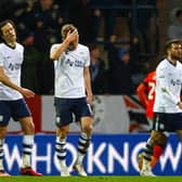 Preston North End's Ali McCann reacts to going a goal down, with Alvaro Fernandez (left) and Troy Parrott (right)
