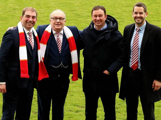 l-r: Morecambe co-chairmen Graham Howse and Rod Taylor, manager Derek Adams and director James Wakefield Picture: Michael Williamson