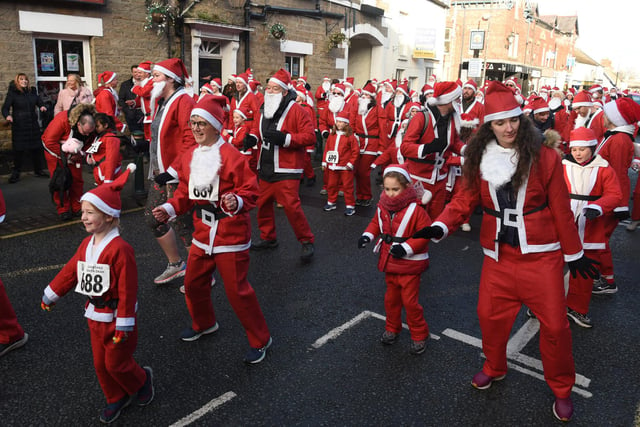 Photo Neil Cross; The Garstang Santa Dash turns into a Santa stroll