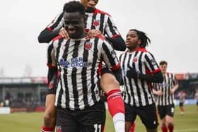 Momodou Touray (front) celebrates his opener with Kole Hall and Dubem Eze(photo: David Airey/dia_images)