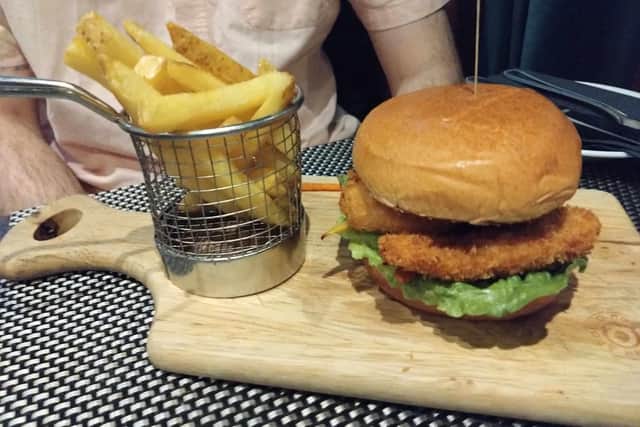 Salt and pepper chicken burger served with skin-on-fries at The Lawrence in Padiham.