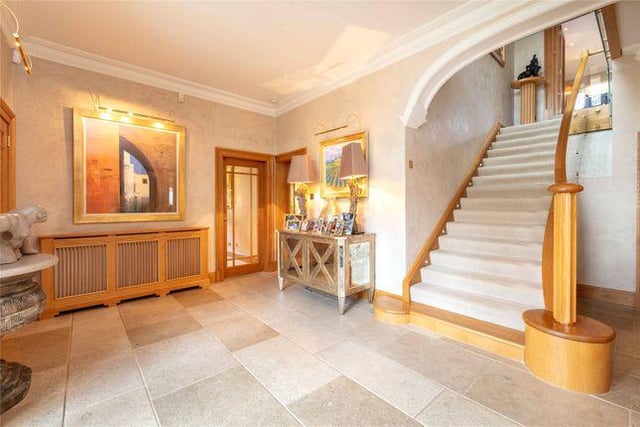 Bright open hallway, with much more marble.