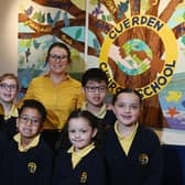 Cuerden Church School's headteacher Nicola Sherry with pupils; they are delighted to retain their good status on their recent Ofsted inspection.
