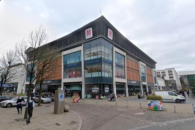 A woman was injured after a man threw a "lit object" inside a shopping centre in Blackburn (Credit: Google)