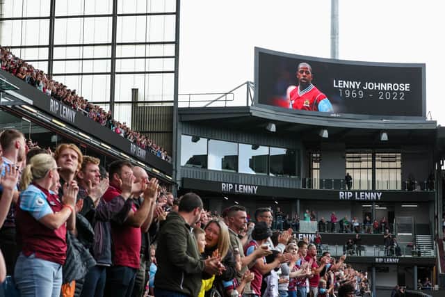 Burnley fans applaud the late Lenny Johnrose, during the matchPhotographer Alex Dodd/CameraSportThe EFL Sky Bet Championship - Burnley v Blackpool - Saturday 20th August 2022 - Turf Moor - BurnleyWorld Copyright © 2022 CameraSport. All rights reserved. 43 Linden Ave. Countesthorpe. Leicester. England. LE8 5PG - Tel: +44 (0) 116 277 4147 - admin@camerasport.com - www.camerasport.com