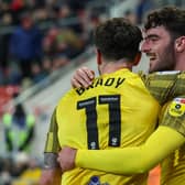 Preston North End's Tom Cannon celebrates scoring with Robbie Brady at Rotherham