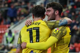 Preston North End's Tom Cannon celebrates scoring with Robbie Brady at Rotherham