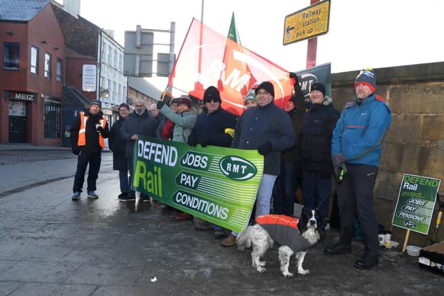 Railway workers strike at Preston Railway Station. Union members are in dispute with the government over pay, jobs and condtions