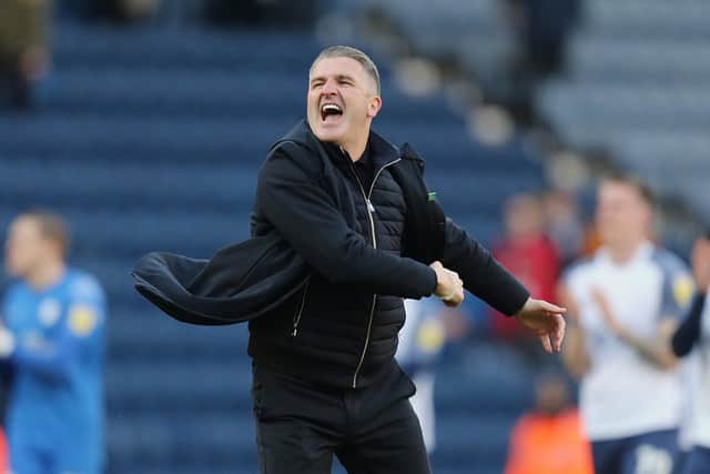 Preston North End manager Ryan Lowe celebrates with the fans after the Deepdale victory over Bournemouth