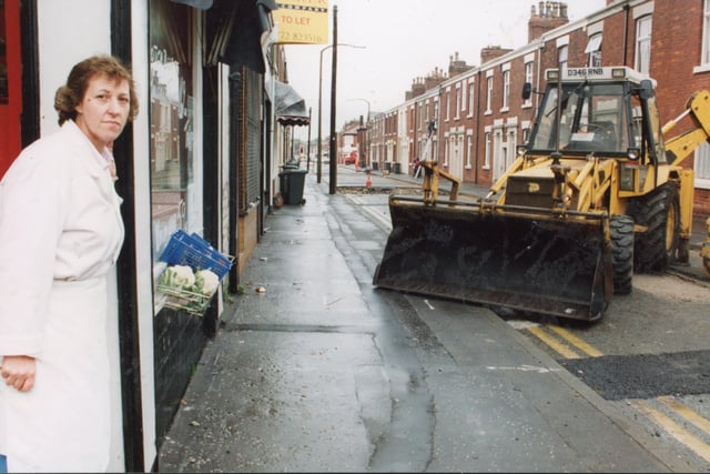 Roadworks again causing a problem - this time for shopkeepers, like Barbara Critchley of Critchley's Butchers shop (pictured here). The repair work in 1991 was to reconstruct the carriageway, footpaths and kerbs