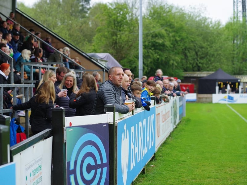 Fans watch on from the sidelines