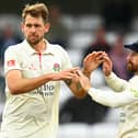 Lancashire bowler Tom Bailey, left,  celebrates the wicket of Lewis Goldsworthy of Somerset with team mate Josh Bohannon during the County Championship match between Somerset and Lancashire.
