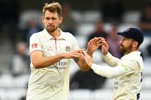 Lancashire bowler Tom Bailey, left, celebrates the wicket of Lewis Goldsworthy of Somerset with team mate Josh Bohannon during the County Championship match between Somerset and Lancashire.