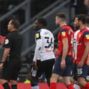 Preston North End defender Liam Lindsay is sent off by referee Geoff Eltringham at Derby County