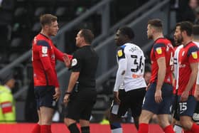Preston North End defender Liam Lindsay is sent off by referee Geoff Eltringham at Derby County