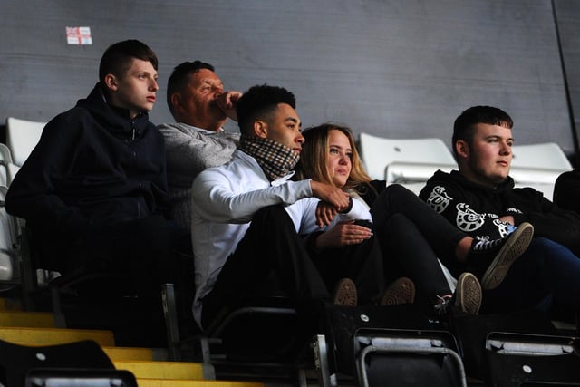Preston North End fans look on during the game