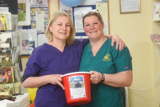 Staff at the Veterinary Health Centre are raising money for Oliver, 16, by riding a bike and selling cakes.  Pictured is Oliver's mum Sheena Johnson with Sarah Veevers.