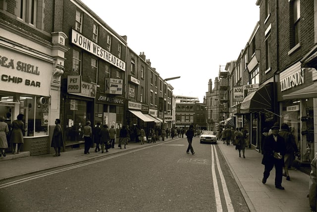 This photo of Orchard Street, taken in 1980, is similar to another one in this collection. However, in this image you can just make out the fish and chip shop on the left, next to the closed pet shop